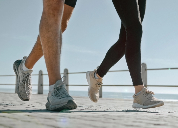 Couples runnning outdoors